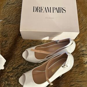 White platform shoes by Dream Paris